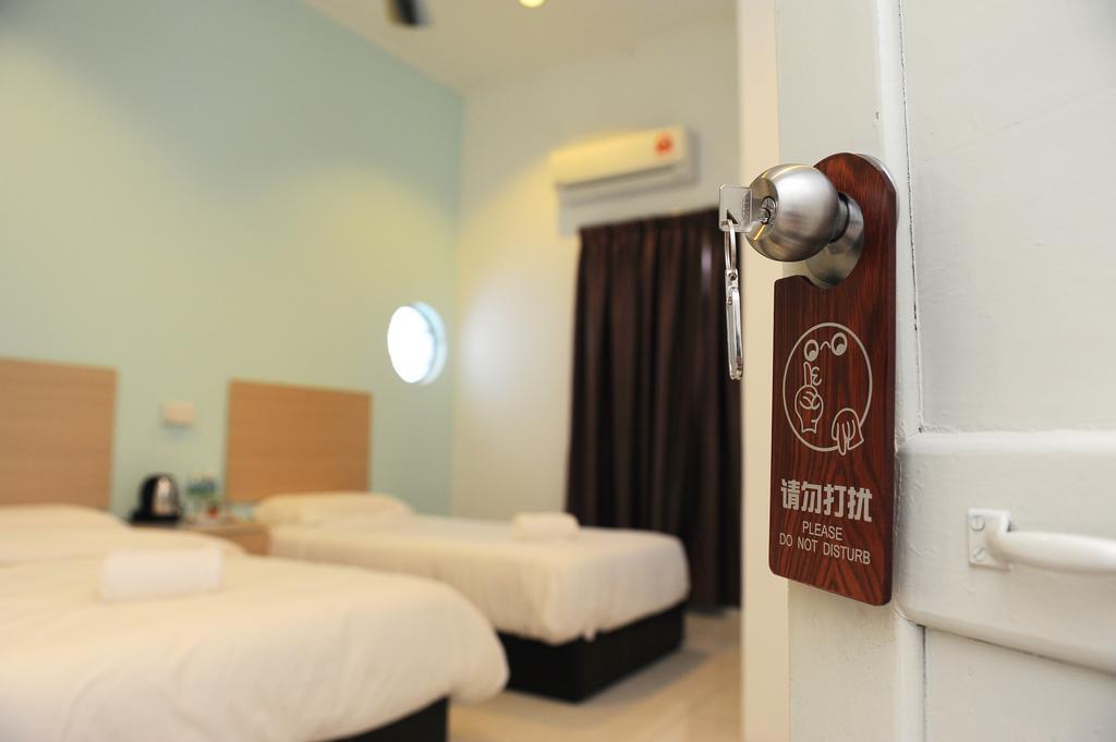 Raintown Inn Taiping Bagian luar foto